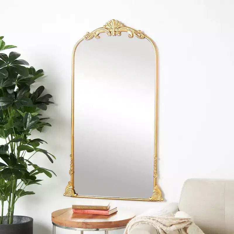 Miroir de sol baroque arqué en métal Olivia & May 122 x 71 cm doré : style vintage, fixation œillet, cadre en bois
