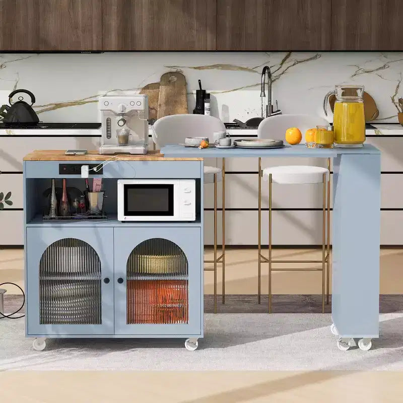 Îlot de cuisine roulant avec table extensible, éclairage LED, prises électriques, portes vitrées, rangement et étagères ouvertes