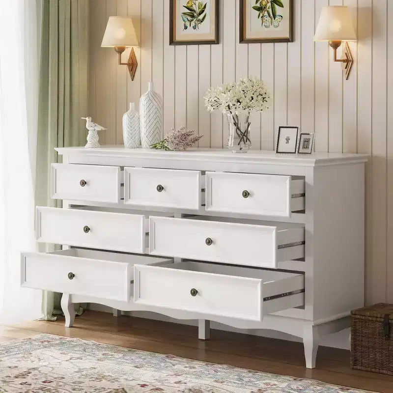 Commode Heynemo pour chambre à coucher, commode à 7 tiroirs avec pieds en bois distinctifs et finition peinte, idéale pour chambre à coucher, salon, couloir