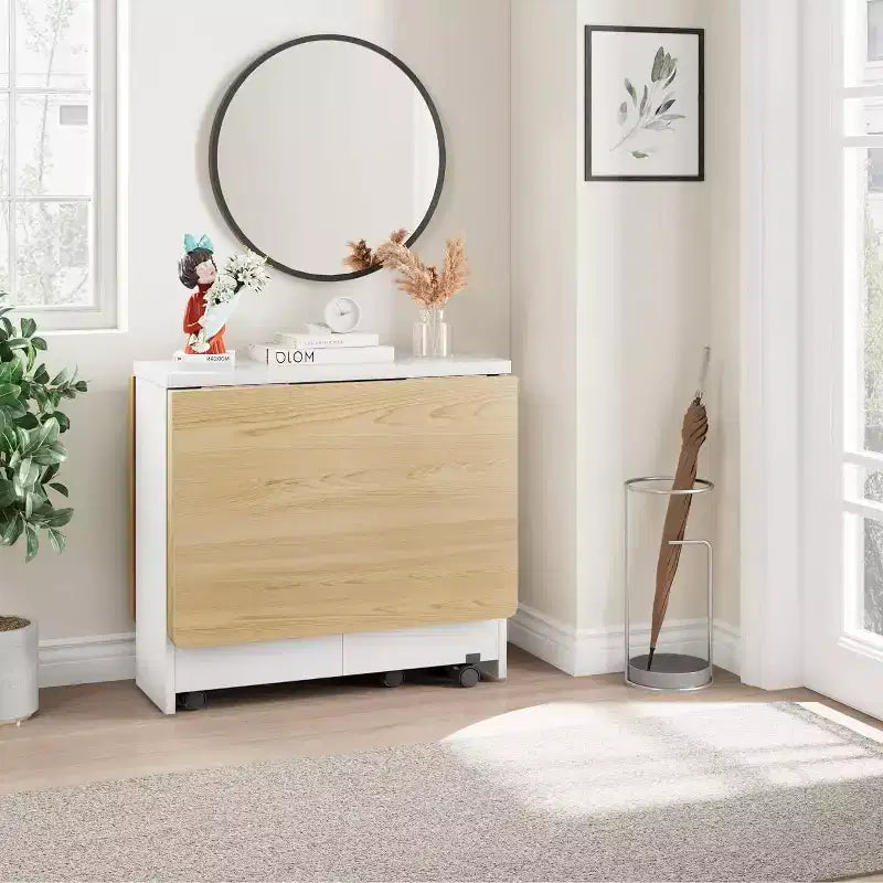 Table de salle à manger pliable et compacte pour 4 personnes avec abattant, 2 étagères de rangement et 6 roulettes pour une mobilité facile