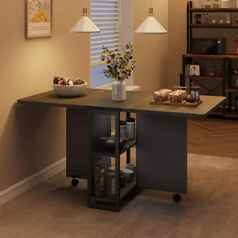 Table de salle à manger pliable et compacte pour 4 personnes avec abattant, 2 étagères de rangement et 6 roulettes pour une mobilité facile