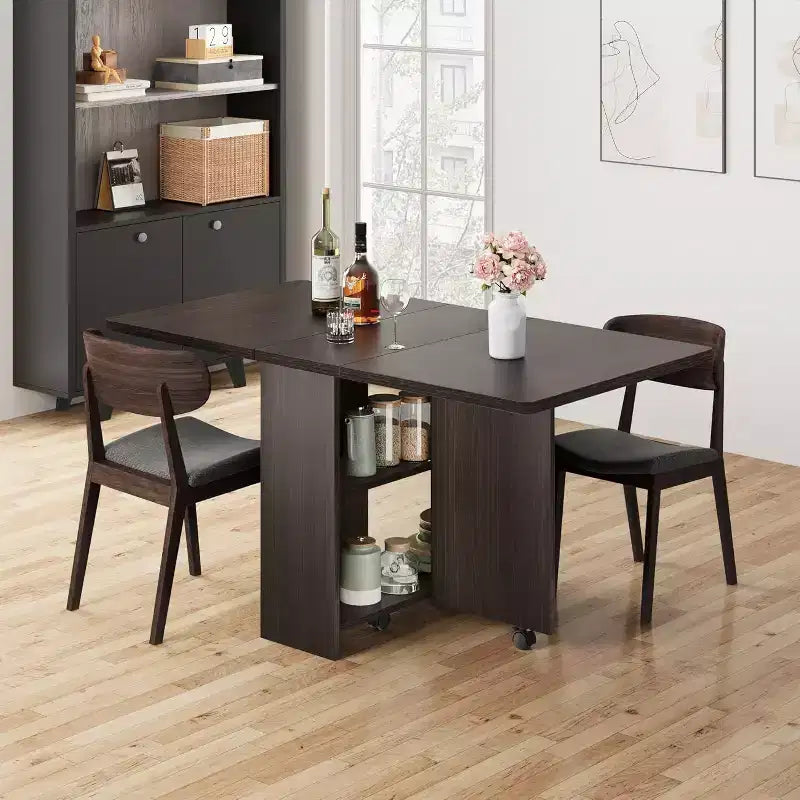 Table de salle à manger pliable et compacte pour 4 personnes avec abattant, 2 étagères de rangement et 6 roulettes pour une mobilité facile