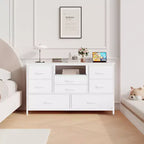 Meuble TV commode avec prise de courant et lumières LED pour téléviseur de 55", centre de divertissement à 8 tiroirs, commode en tissu avec plateau en bois, noir