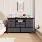 Meuble TV commode avec prise de courant et lumières LED pour téléviseur de 55", centre de divertissement à 8 tiroirs, commode en tissu avec plateau en bois, noir