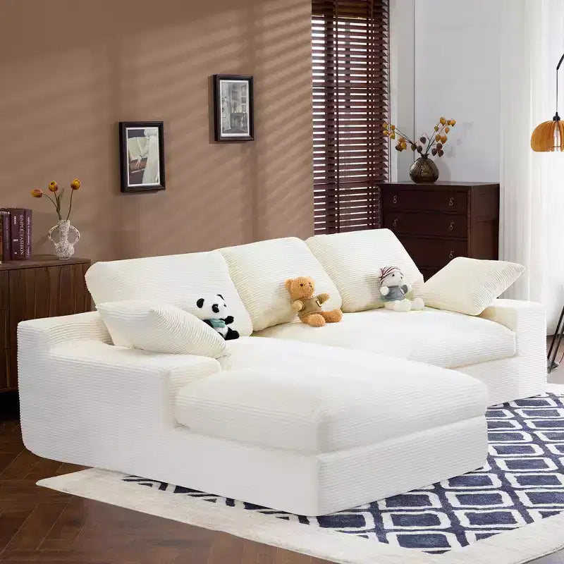 Canapé confortable en velours côtelé blanc avec 5 coussins – L'indispensable du salon douillet