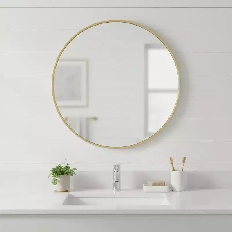Miroir de salle de bain HomeRoots 30 avec cadre rond en métal doré