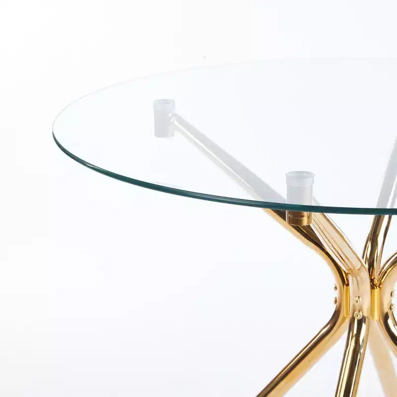 Table à manger avec pied en métal chromé et plateau en verre trempé, design moderne et compact pour la cuisine ou le salon