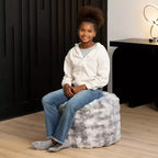 Pouf accent rond Raven Ottoman par Raven-Symon Home - Fausse fourrure