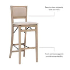 Tabouret de bar pliant Keira avec dossier rembourré en bois massif et siège rembourré, finition gris délavé - Linon