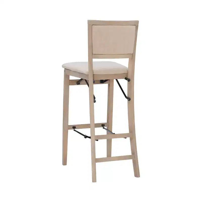 Tabouret de bar pliant Keira avec dossier rembourré en bois massif et siège rembourré, finition gris délavé - Linon