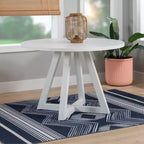 Table de salle à manger ronde en bois massif Shelby Powell, blanche : 4 places, piètement en colonne laqué, 112 cm de largeur
