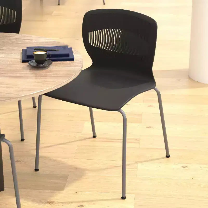 Chaise empilable ergonomique en polypropylène Emma and Oliver, capacité 350 kg, avec support lombaire et structure en acier
