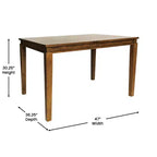 Table à manger en bois Merrick Lane avec pieds fuselés