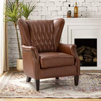 Fauteuil en cuir véritable Valerius avec garniture cloutée et pieds en bois massif | HULALA HOME