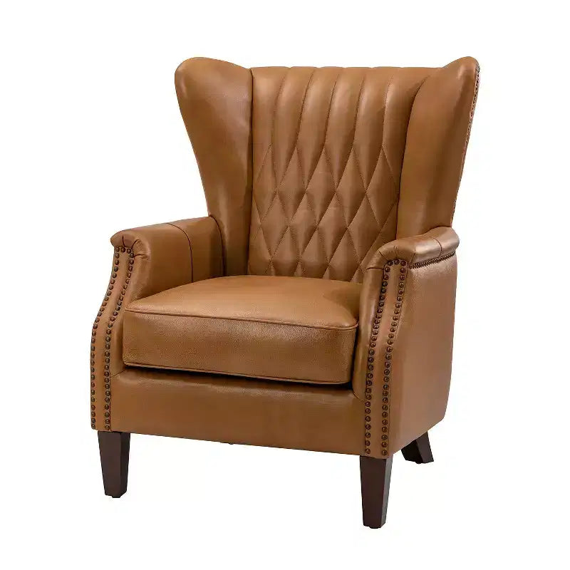 Fauteuil en cuir véritable Valerius avec garniture cloutée et pieds en bois massif | HULALA HOME