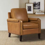 Fauteuil Hellmuth en cuir véritable avec coussin amovible et garnitures cloutées | HULALA HOME