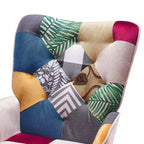 Fauteuil d'appoint à dossier haut capitonné Patchwork FERPIT avec pieds en bois d'hévéa
