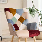 Fauteuil d'appoint à dossier haut capitonné Patchwork FERPIT avec pieds en bois d'hévéa