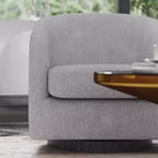 Fauteuil club capitonné Emma and Oliver de style tonneau avec base pivotante à 360 degrés revêtue de vinyle et accoudoirs inclinés