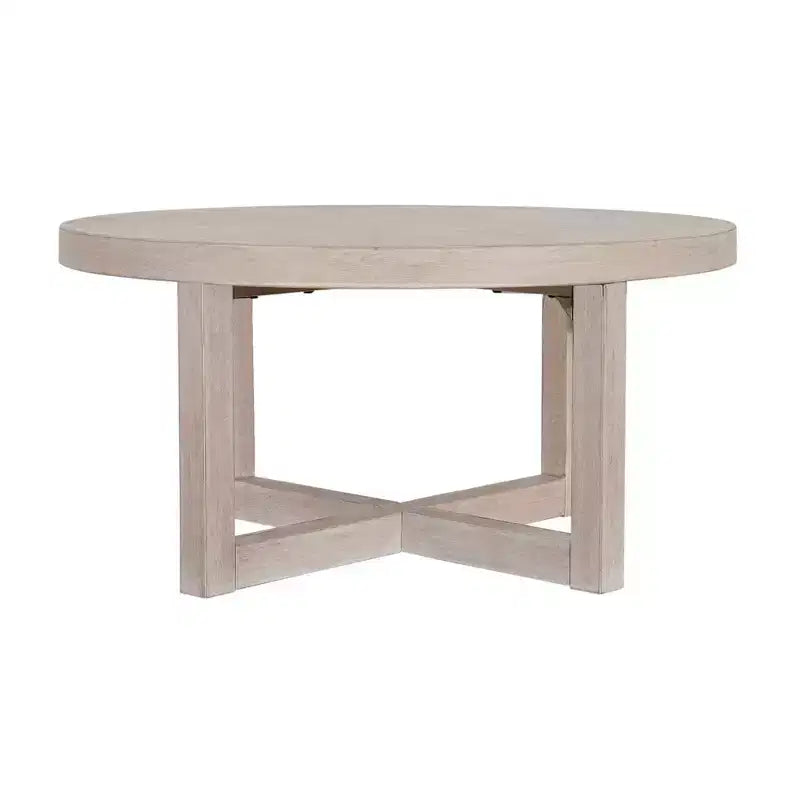 Table basse ronde East at Main 38 avec piétement entrecroisé