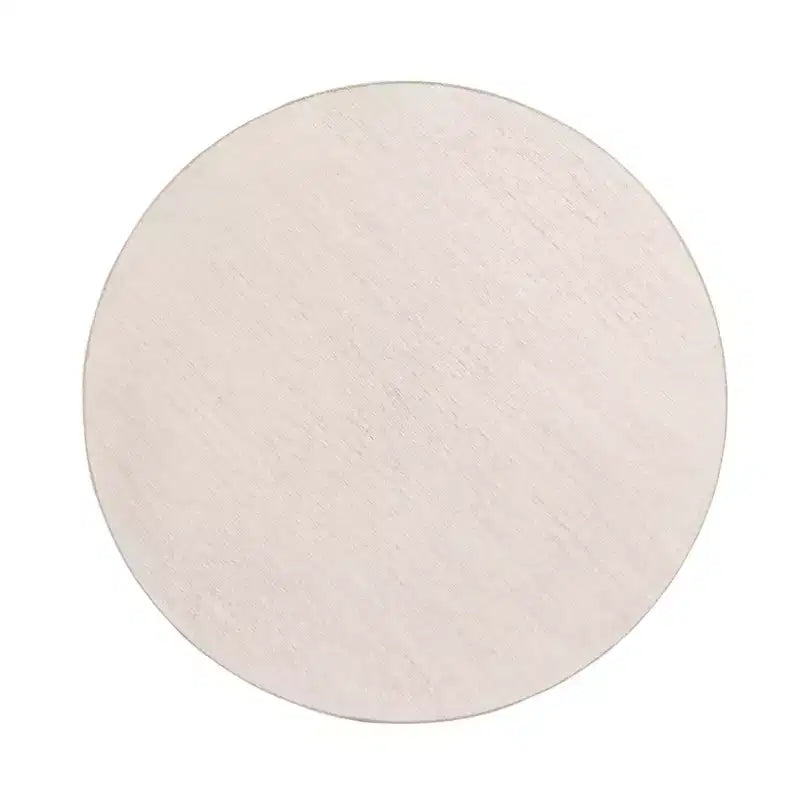 Table basse ronde East at Main 38 avec piétement entrecroisé