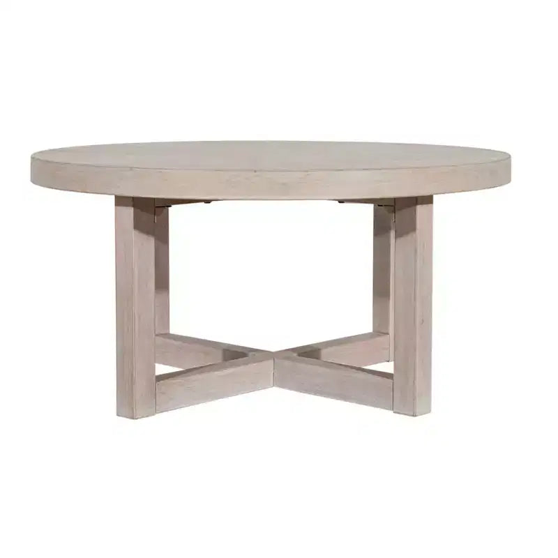 Table basse ronde East at Main 38 avec piétement entrecroisé