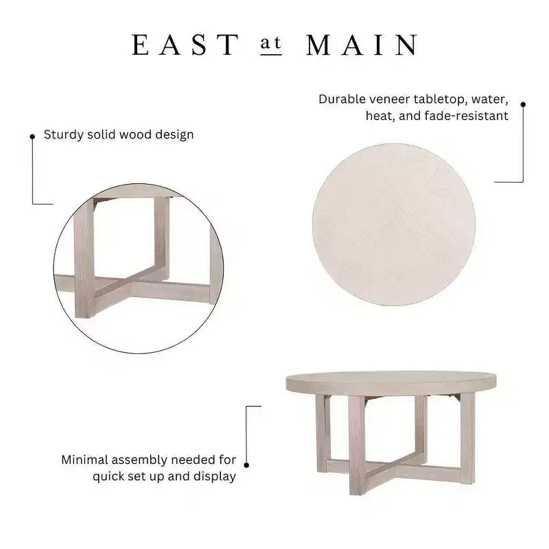Table basse ronde East at Main 38 avec piétement entrecroisé
