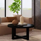 Table basse ronde East at Main 38 avec piétement entrecroisé