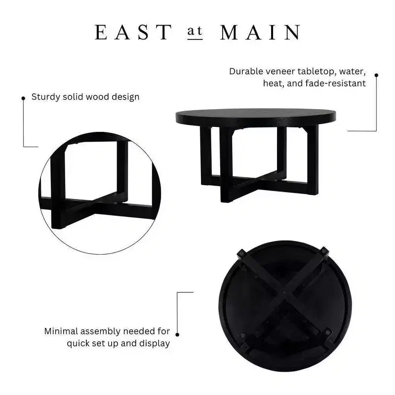 Table basse ronde East at Main 38 avec piétement entrecroisé
