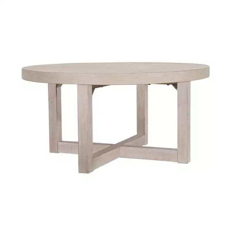 Table basse ronde East at Main 38 avec piétement entrecroisé